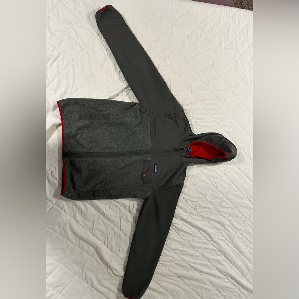 Hooded Patagonia Synchilla fleece. Gray with red trim. Lightly worn.